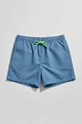 A pair of men's casual swim shorts in a dusty medium blue color, featuring an elastic waistband and a bright lime green drawstring, laid flat on a light gray background.