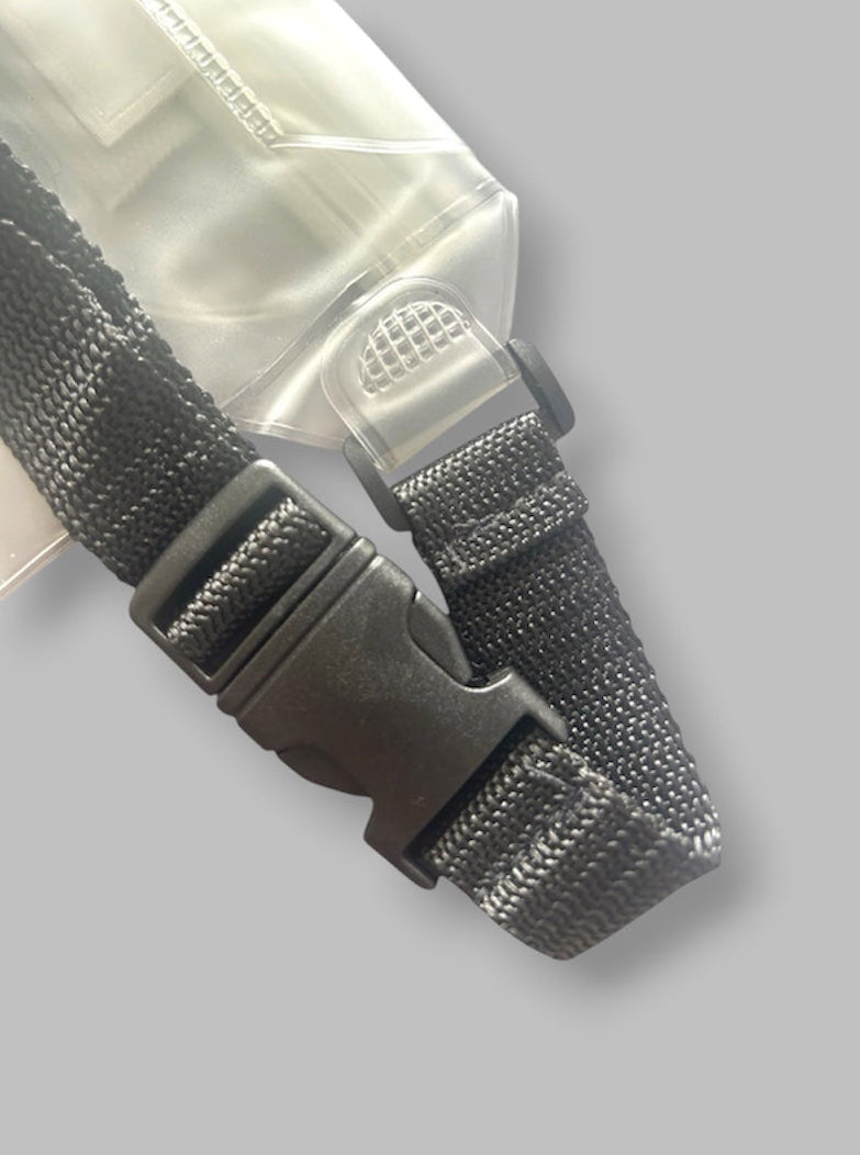Close-up of a black strap with a buckle on a light gray background