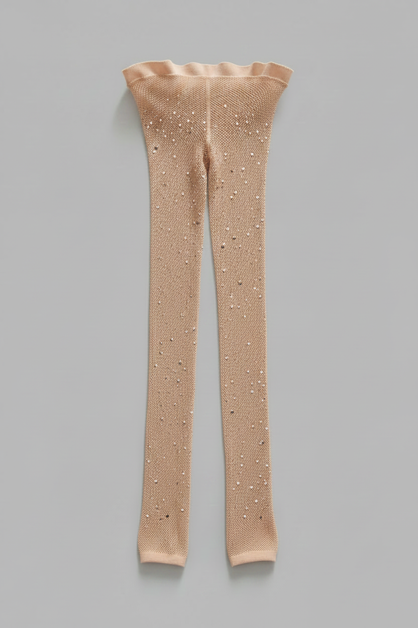 Beige rhinestone fishnet tights flat lay